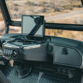 Passenger-side dash view of Epic E40 with carbon fiber accents – luxury golf cart design