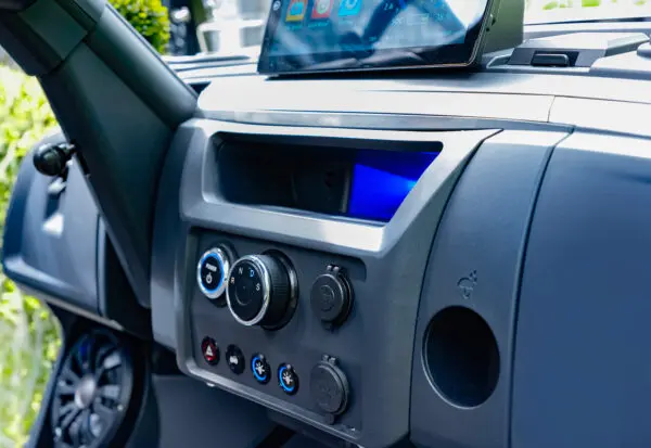Epic E40FX center dash controls with 10.1-inch touchscreen – ICON golf cart with modern infotainment and climate dials
