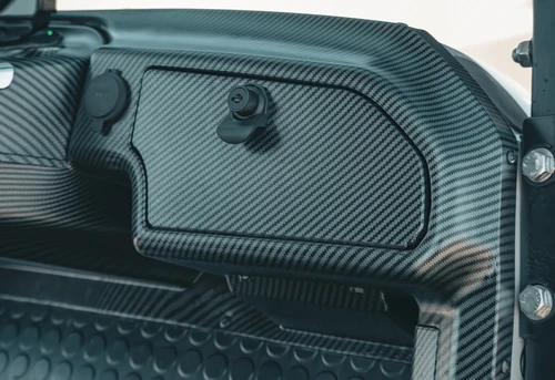 Interior storage compartment on carbon fiber dash of 2025 EPIC E40L
