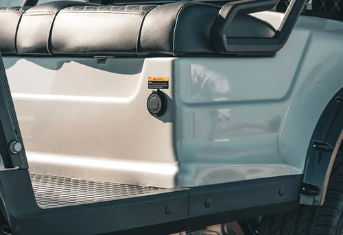 Rear fender and tail light zone of EPIC E40L showing textured utility platform