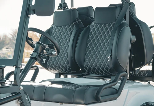 Diamond-stitched high-back bolstered seats and steering column of 2025 EPIC E40L golf cart