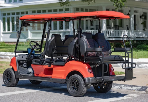 Rear-side angle of red EPIC E60 golf cart showing passenger seats and rear step-up platform