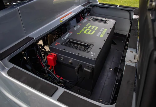 Open battery compartment of EPIC E60L showing 51V 105Ah ECO Lithium battery and wiring layout