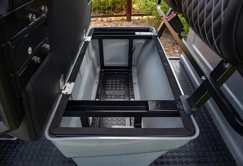 Under-seat cooler and cargo storage compartment on EPIC E60L rear bench