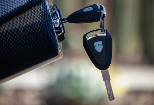 Close-up of smart key fob and carbon fiber dash of ICON i40 electric cart