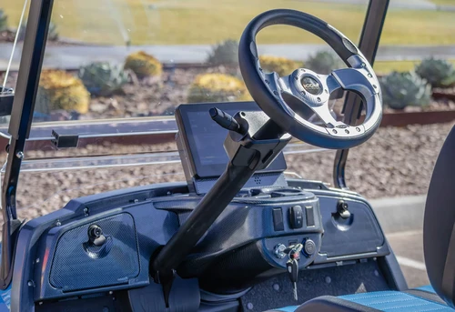 Steering wheel and full dashboard layout of ICON i40 electric cart – interior view