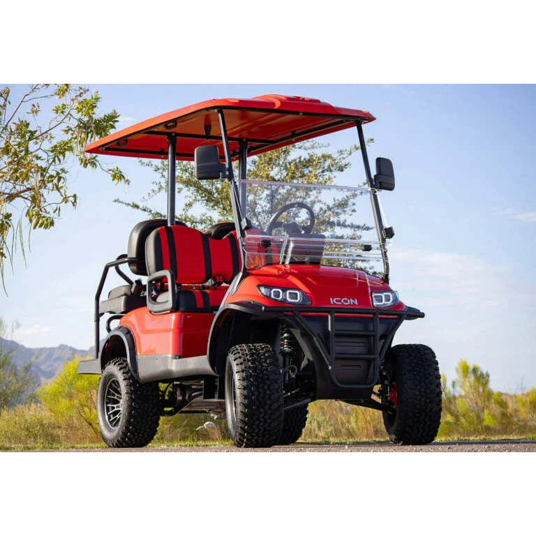 ICON i40L lifted electric golf cart in red with black trim – front-facing hero shot highlighting suspension and stance