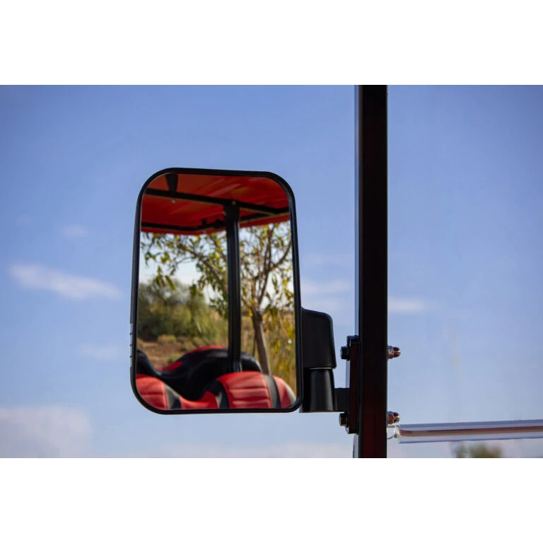 Side mirror on ICON i40L showing wide rear view – road-legal visibility equipment