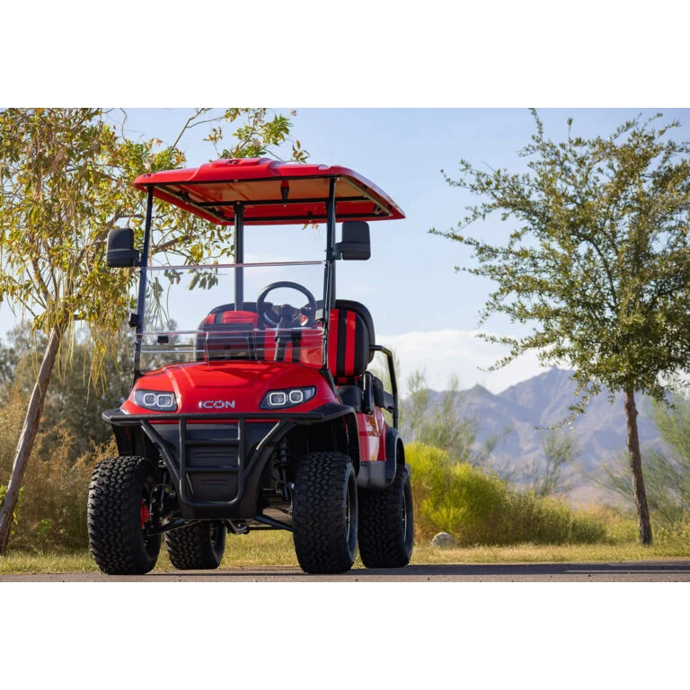 Front-facing side view of ICON i40L with two-tone seats – lifted body and LED bar