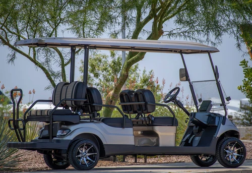 Passenger side view of ICON i60 in silver with extended roof and seating for six