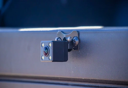 Backup camera mounted on rear bumper of ICON i60
