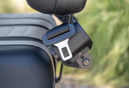 Seatbelt anchor attached to headrest in ICON i60 golf cart