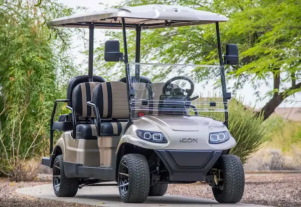 2025 ICON i60 electric golf cart in champagne metallic – 6-passenger street-legal cart with plush seating and foldable windshield