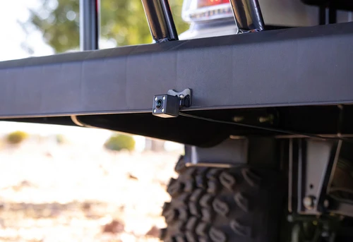 ICON i60L lifted front fender and dual headlight detail with front brush guard and suspension