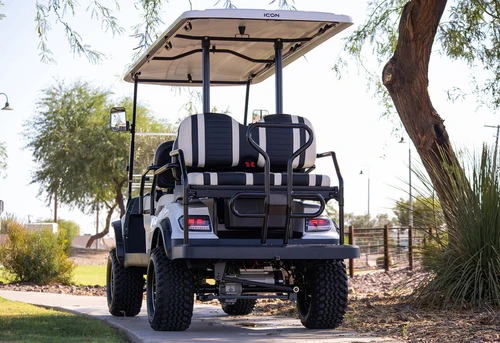 Rear-mounted grab bar and utility bumper on ICON i60L with diamond plate texture